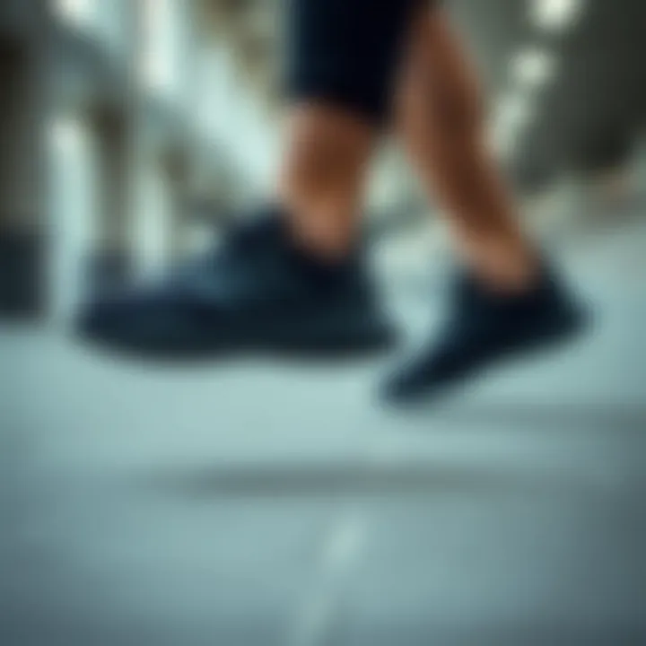 Performance in Motion: Adidas Black Shoes Dynamic movement with black Adidas shoes in action