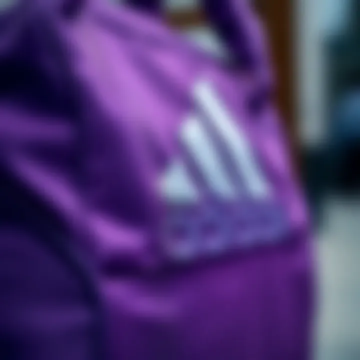 Close-up of the intricate design of an Adidas purple bag