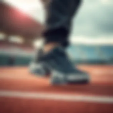 Athlete performing in Air Max Plus shoes on a track
