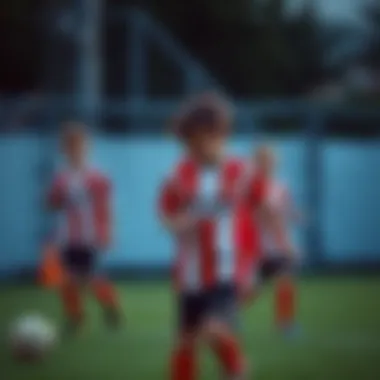 Children playing football in Beşiktaş attire