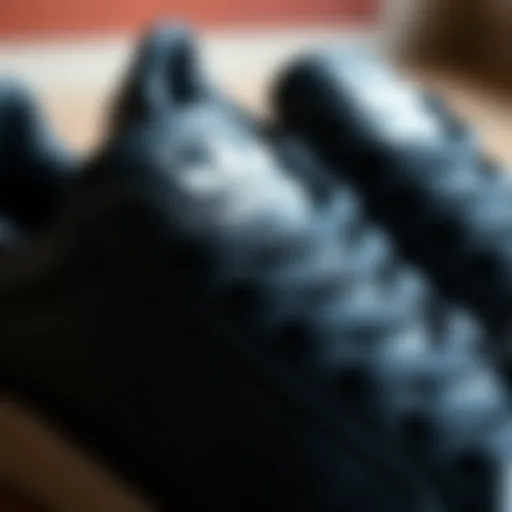 Close-up of the black Adidas Superstar showcasing its iconic three stripes