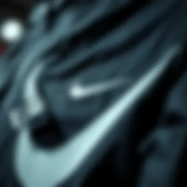 Close-up of Nike black rain jacket technology showcasing water resistance