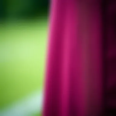 Close-up of maroon fabric highlighting quality and texture.