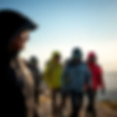 Group of adventurers showcasing softshell jackets in nature