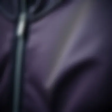 A close-up of the fabric texture of a zip jacket, emphasizing quality.